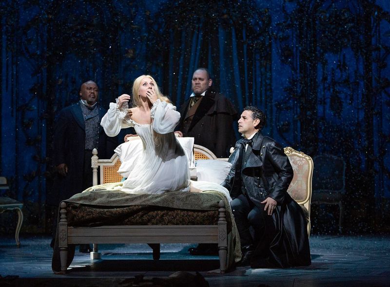 Kevin Short as Dr. Grenvil, Diana Damrau as Violetta, Quinn Kelsey as Giorgio Germont, and Juan Diego Flórez as Alfredo in Verdi's "La Traviata."