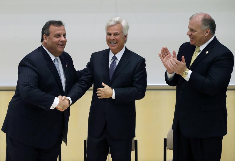 Gov. Chris Christie, George Norcross, and State Senate President Steve Sweeney at a groundbreaking ceremony in 2014, in Camden for a Norcross-funded school.