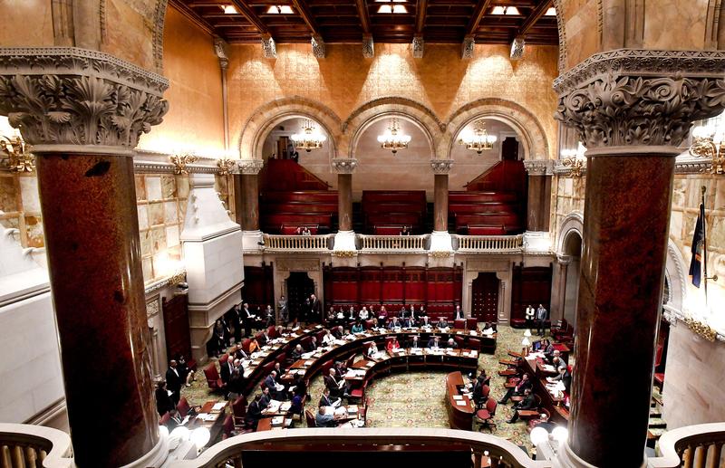 Members of the New York state Senate debate budget bills during session in Senate Chamber at the state Capitol Sunday, March, 31, 2019, in Albany, N.Y.