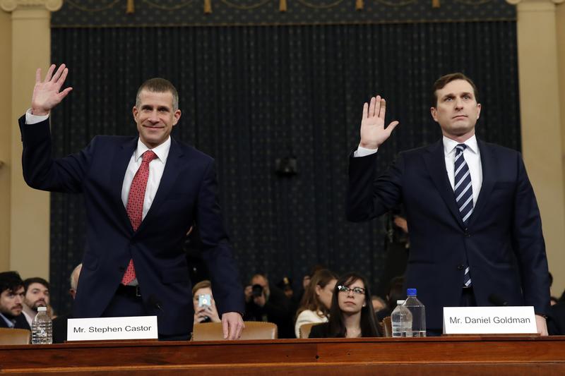 Republican staff attorney Steve Castor, left, and Democratic staff attorney Daniel Goldman and are sworn in to testify. Dec. 9, 2019, on Capitol Hill in Washington.