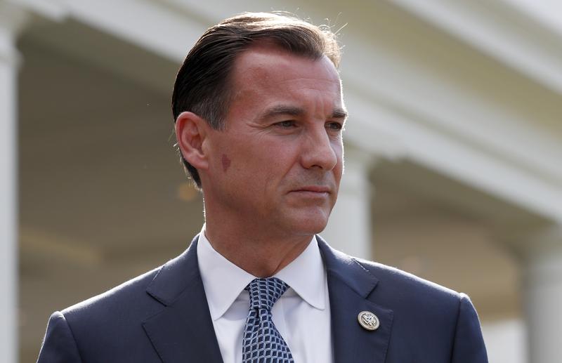 Rep. Thomas Suozzi, D-N.Y., pauses while speaking with the media in front of the West Wing.