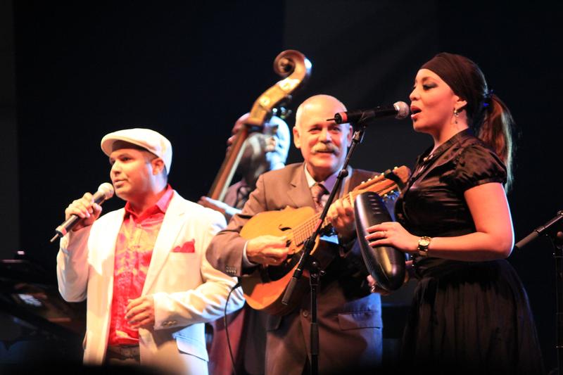 Carlos Calunga, Barbarito Torres and Idania Valdés performing with Orquesta Buena Vista Social Club in 2012