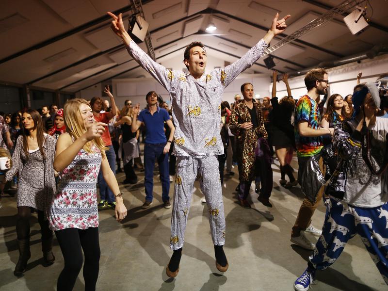 Revelers dance in their pajamas at Morning Gloryville in London in January. The nightclub, which holds a rave once a month beginning at 6:30 a.m., has inspired morning raves in a number of other cities around the world.