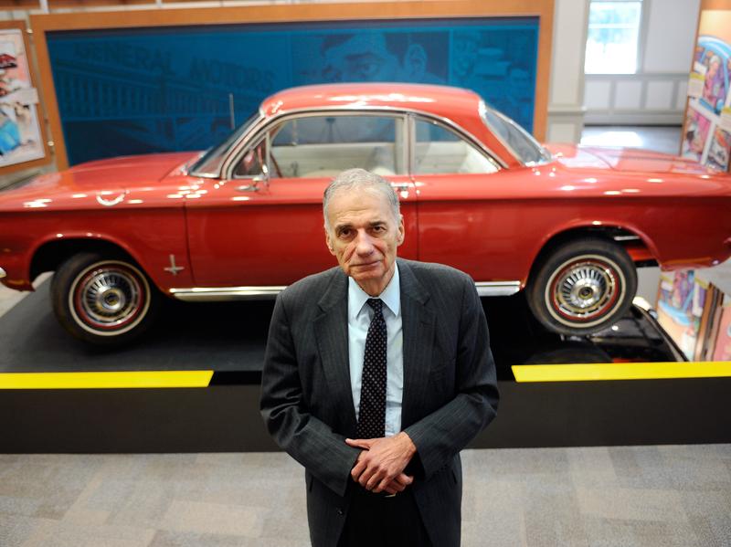 Consumer advocate Ralph Nader poses in front of a Chevrolet Corvair in the American Museum of Tort Law in Winsted, Conn. Nader featured the Corvair in his 1965 book on the auto industry's safety record, <em>Unsafe At Any Speed</em>.