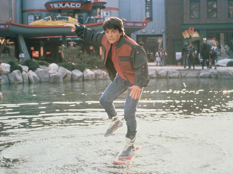 In <em>Back to the Future Part II,</em> Marty McFly (Michael J. Fox) slips on his Nike sneakers and rides a Mattel hoverboard in front of a Texaco gas station.