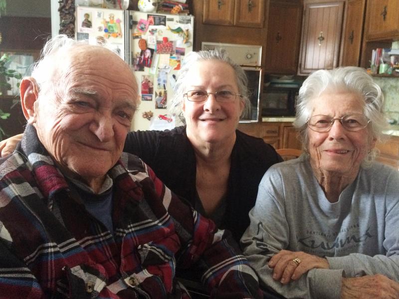 Bob Ebeling with his daughter Kathy (center) and his wife, Darlene.