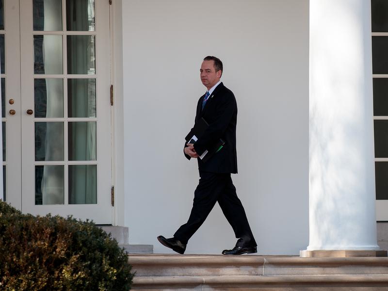 White House Chief of Staff Reince Priebus, seen here walking toward the Oval Office in January, had been in touch with the FBI over media reports about Trump associates and contacts with Russia, according to a senior administration official.