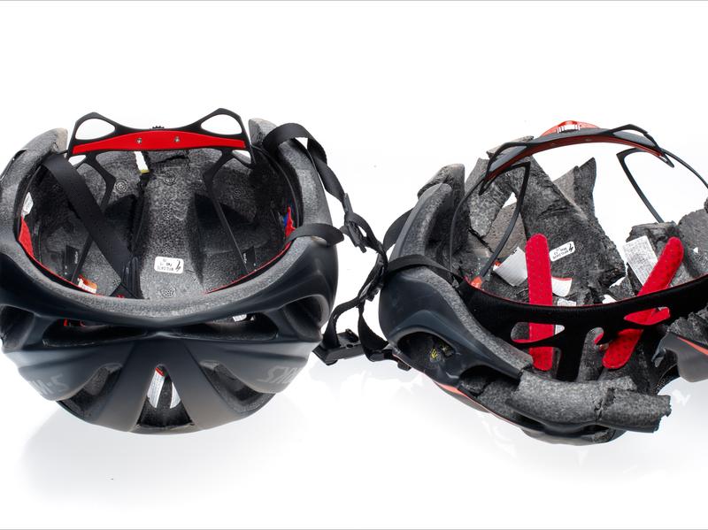 After impact, the authentic Specialized Evade helmet on the left held up but the counterfeit on the right crumbled. Specialized says the fakes lack reinforced roll cages — internal skeletons that hold the helmets together even after a crash.