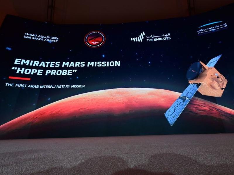 A picture taken on July 19, 2020, shows a screen broadcasting the launch of the "Hope" Mars probe at the Mohammed Bin Rashid Space Centre in Dubai. "Hope" — Al-Amal in Arabic — is expected to start orbiting Mars this week, marking the 50th anniversary of the unification of the UAE.