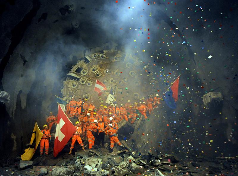 Workers celebrate the breakthrough of the second shaft of Gotthard Tunnel in Sedrun, Switzerland, on October 15, 2010.