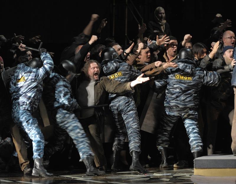 Actors, some of them wearing uniforms of present-day Russia's riot police, in a new production of 'Boris Godunov' at the Mariinsky Theatre