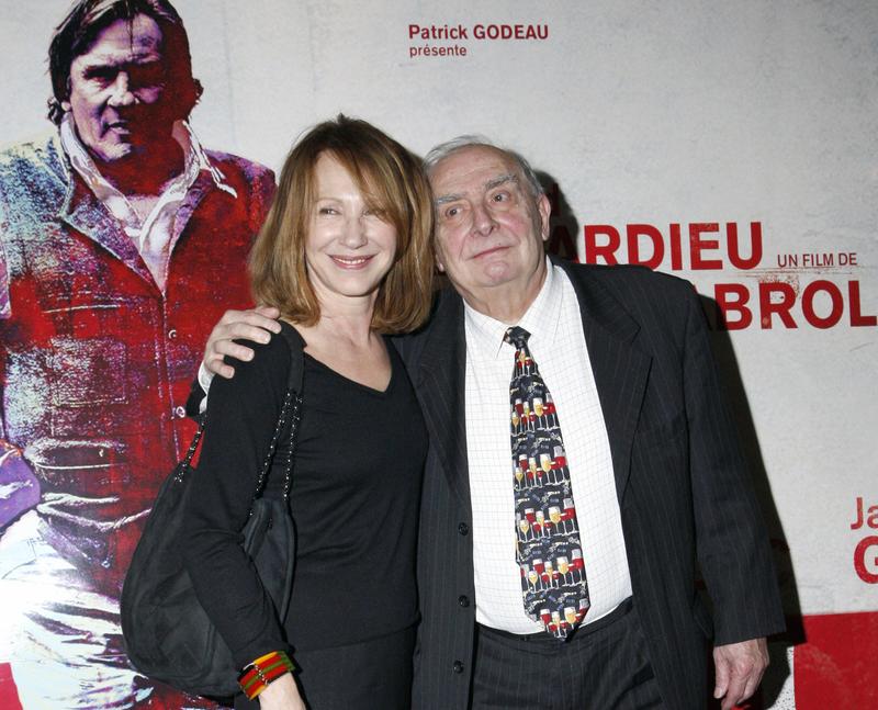 French actress Nathalie Baye poses with French director Claude Chabrol after a party to celebrate Chabrol's 50 year-long career, on February 19, 2009, in Paris. 