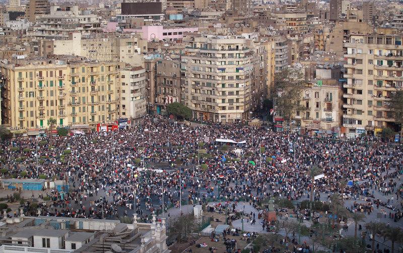  Protestors defy the curfew in Tahrir Square on January 31, 2011 in Cairo, Egypt.