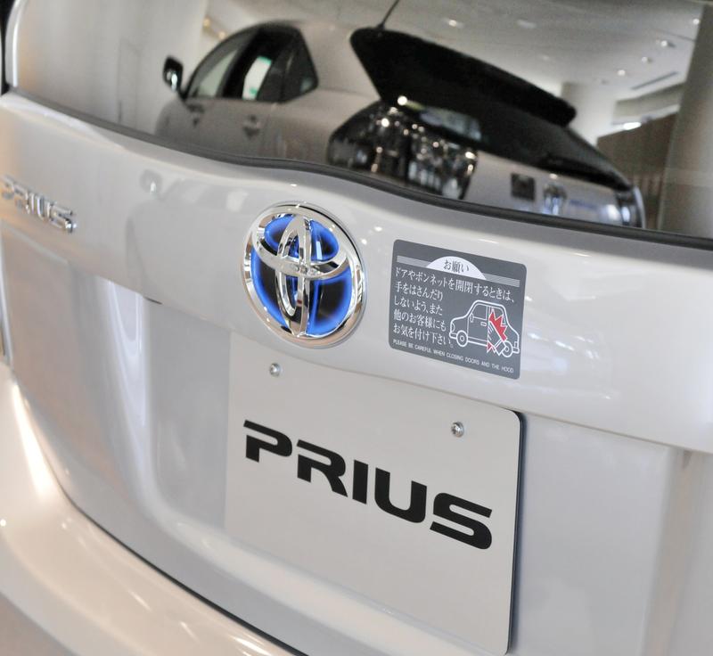 A picture shows the logo on a Toyota Prius hybrid vehicle at the company's showroom in Tokyo on February 4, 2010.