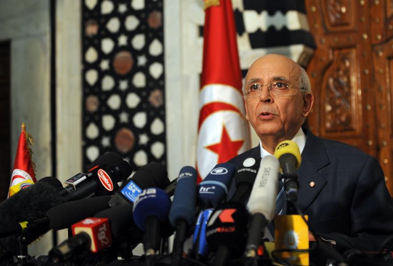 Tunisian Prime Minister Mohamed Ghannouchi announces the new government during a press conference at the Tunisian president's office on January 17, 2011 in Tunis. 