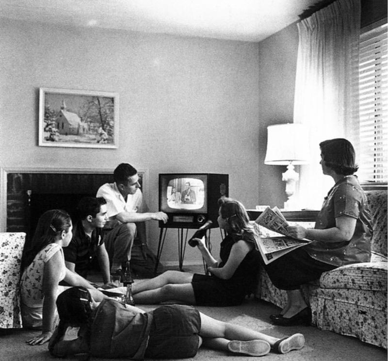 Family watching television in 1958.