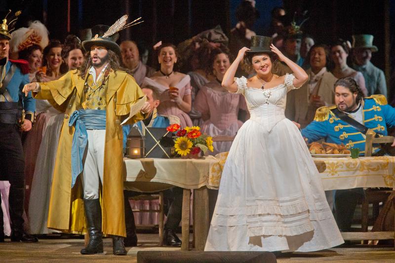 Erwin Schrott as Dulcamara and Anna Netrebko as Adina in Donizetti’s “L’Elisir d’Amore” at the Metropolitan Opera on January 17, 2014. 