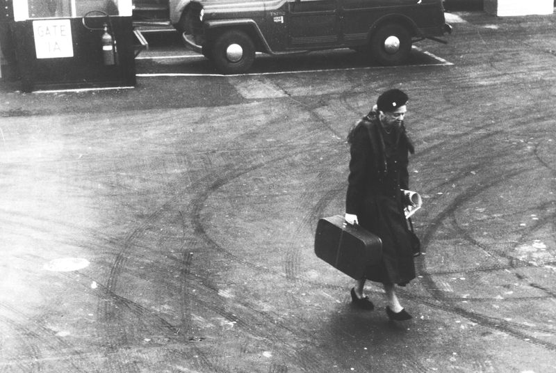 Eleanor Roosevelt carrying her suitcase at LaGuardia Airport, New York in 1960.