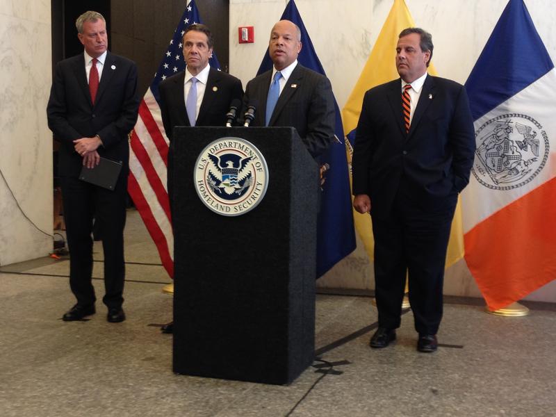 U. S. Secretary of Homeland Security Jeh Johnson speaks in Midtown on September 15, 2014 while Mayor Bill de Blasio, New York Governor Andrew Cuomo and New Jersey Governor Chris Christie watch