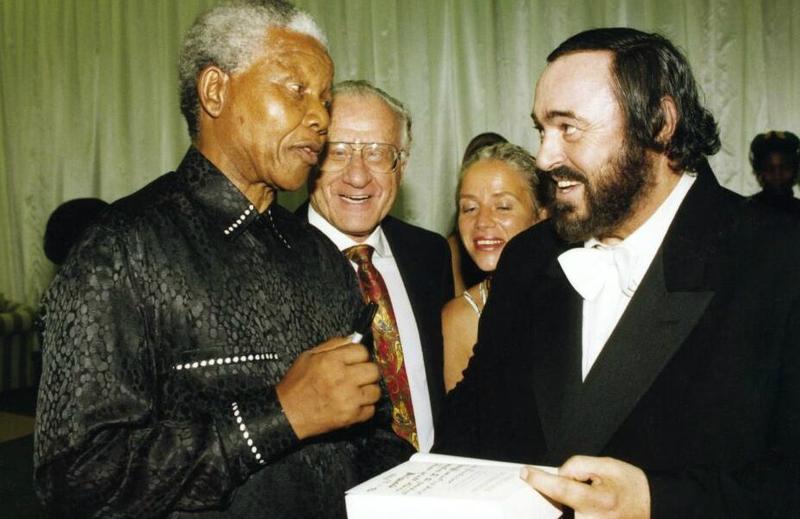 Nelson Mandela with tenor Luciano Pavarotti in an undated photo.