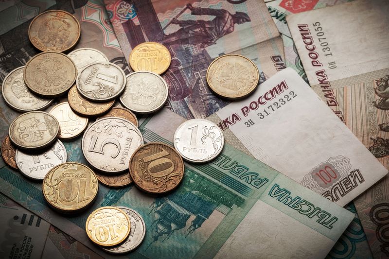 Ruble banknotes and coins.