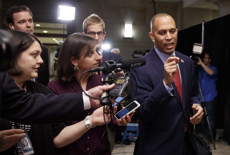 Rep. Hakeem Jeffries, D-N.Y., talks with reporters as he walks to Democratic Caucus leadership elections on Capitol Hill in Washington, Wednesday, Nov. 28, 2018. 