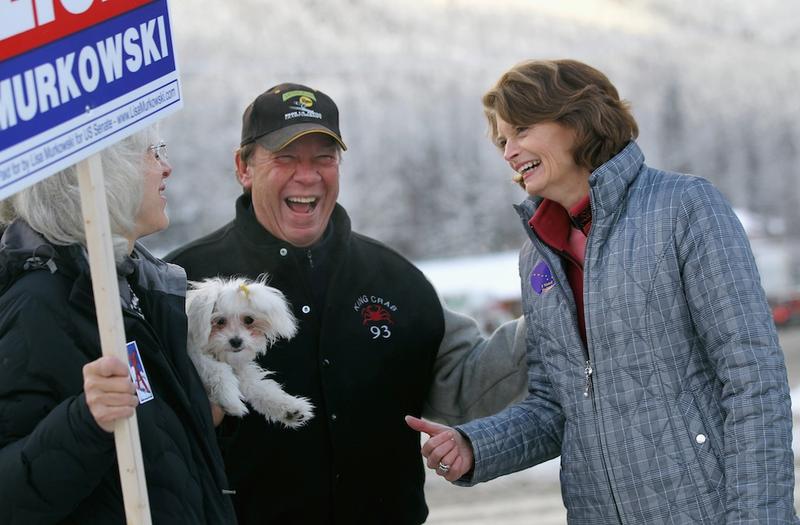 U.S. Sen. Lisa Murkowski (R-AK) greets supporter Rick Petre after casting her vote on November 2, 2010 in Girdwood, Alaska.