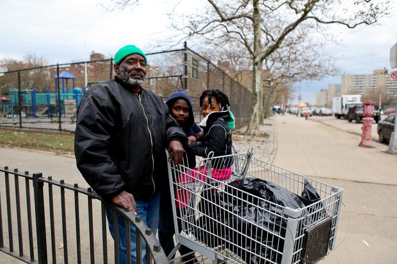 Eddie Span, his son and niece a few days after Sandy. Span said NYCHA hadn't done anything to help residents of the Hammel Houses.