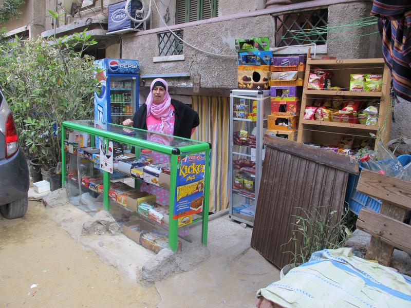 Om Fathi runs a kiosk out of her small basement apartment in central Cairo.
