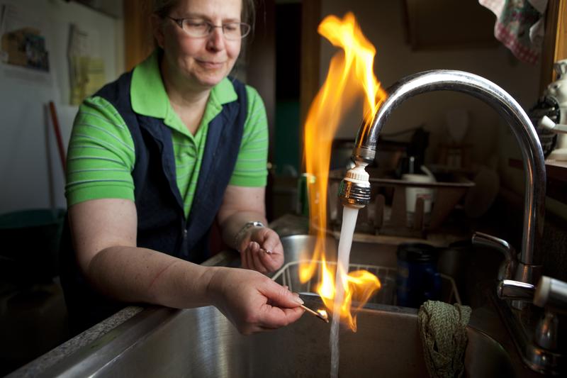 Sherry Vargson ignites tap water in her kitchen on 3/19/12 in Granville Summit, Pennsylvania. The Vargson's home is in the Marcellus Shale region. Methane polluted the well, making the water flammable