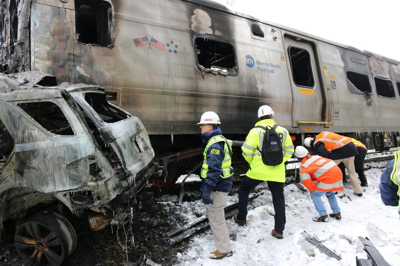 NTSB staffers surveying the Metro North train crash