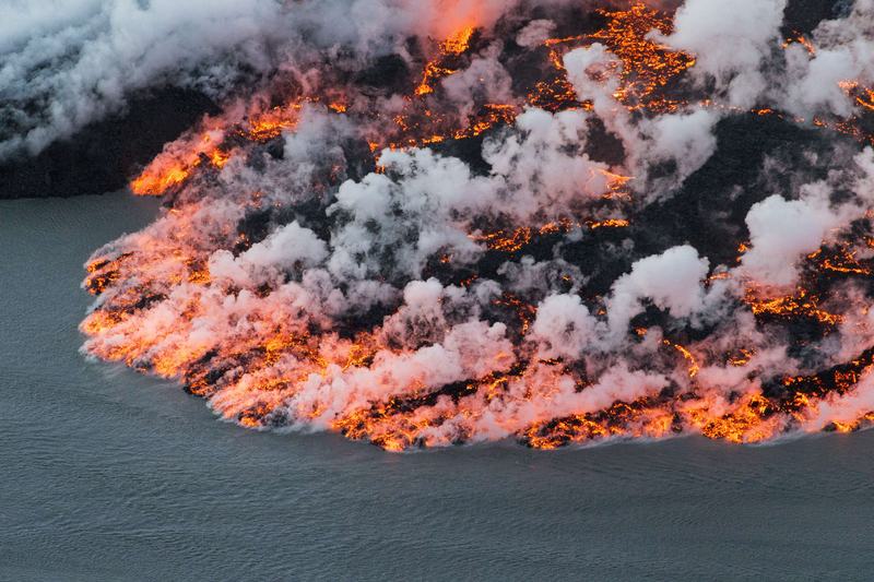 An aerial picture taken on September 14, 2014 shows lava flowing out of the Bardarbunga volcano in southeast Iceland.