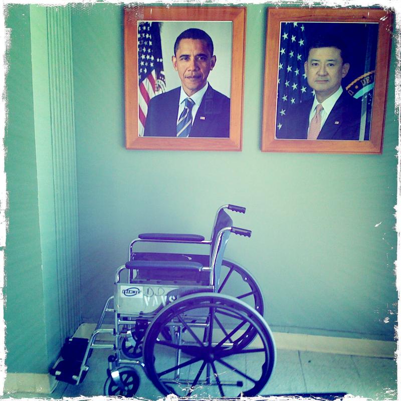 A wheelchair sits in a corner at a Veteran's hospital.