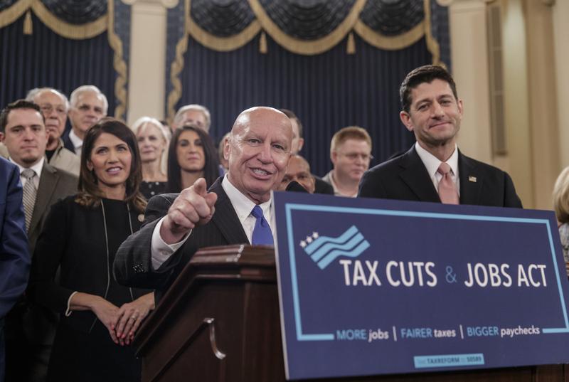 House Ways and Means Committee Chairman Kevin Brady, R-Texas, joined by Speaker of the House Paul Ryan, R-Wis., right, discusses the GOP's far-reaching tax overhaul.