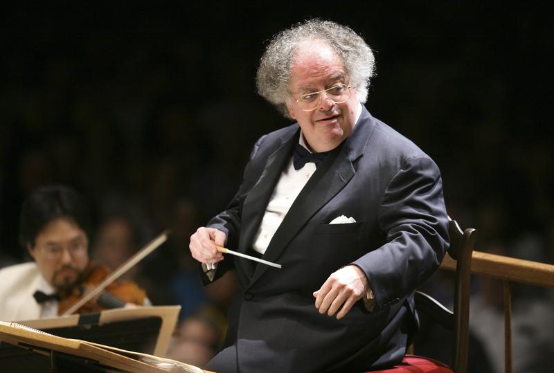 In this July 7, 2006 file photo, Boston Symphony Orchestra music director James Levine conducts the symphony on its opening night performance at Tanglewood in Lenox., Mass.