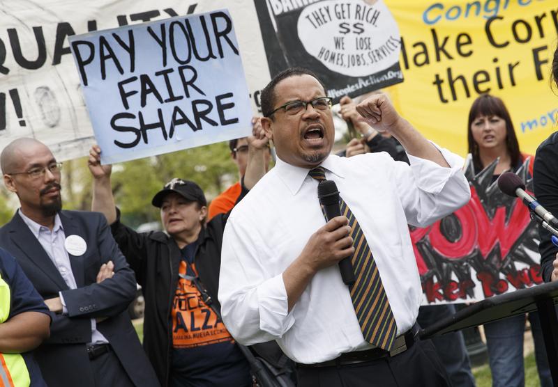 Rep. Keith Ellison, D-Minn. joins low-wage workers at a rally outside the Capitol in Washington, Monday, April 28, 2014, to urge Congress to raise the minimum wage as lawmakers return to Washington.