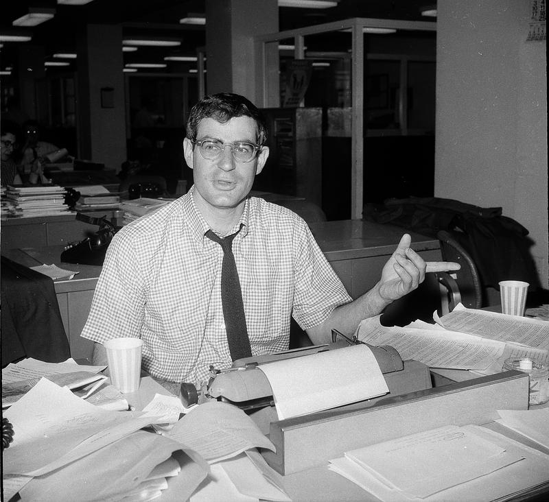 Journalist David Halberstam, New York Times correspondent who is awarded the 1964 Pulitzer Prize for his international reporting of the Vietnam War, is shown at his desk in New York in 1964.