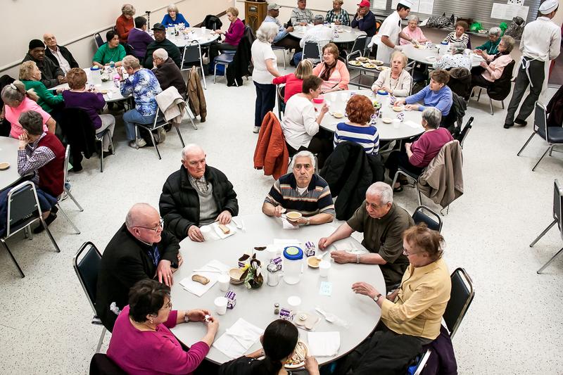 Wide shot of the dining room at the senior center.