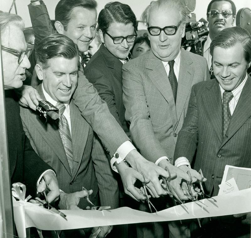 William Ronan (2nd from right) April 16, 1973 ribbon cutting ceremony in Stamford, CT to introduce the new M-2 Cosmopolitan commuter train cars to the Penn Central system.