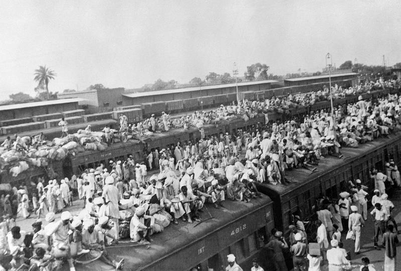 October 1947. Wagons packed with Muslin refugees fleeing to Pakistan while Indus fled to India by train in the border city of Amritsar between the two countries at the start of the India-Pakistan War