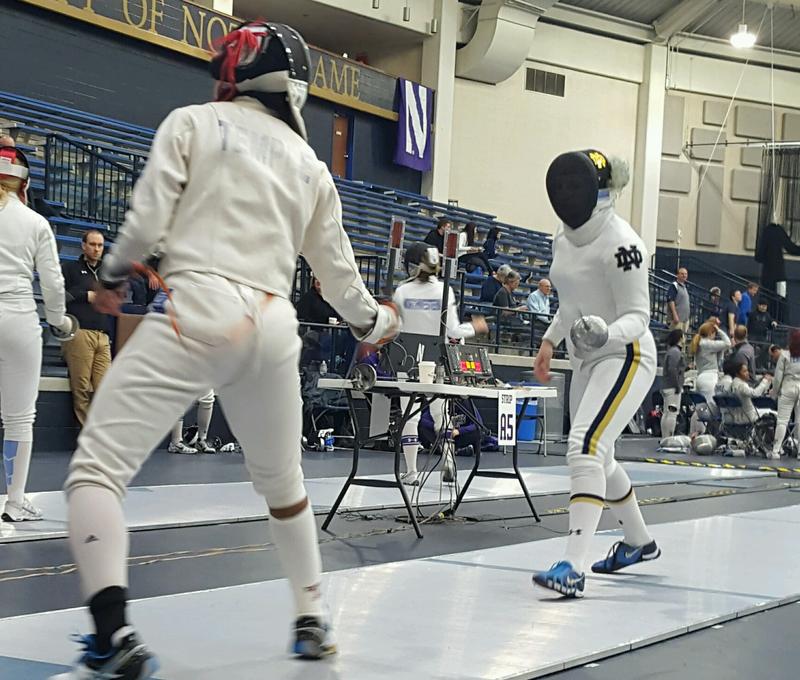 Safa Ibrahim (on left) fencing during a tournament