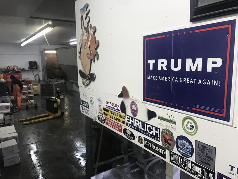 The staircase leading down to the floor where the oysters are
 shucked at Harris Seafood Company in Grasonville, MD, reflects the political
 views of the women in the office.