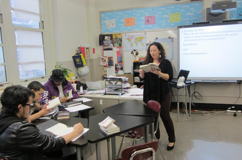 English teacher Erin Bauer helping students write an effective introduction, before the January Regents