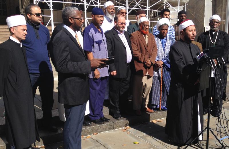 Members from the Islamic Leadership Council of Metropolitan New York gather at City Hall to denounce violence by extremist groups.