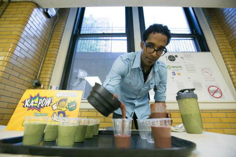 Armando Batista, Kapow creator, pouring one of his fruit and veggie concoctions. 