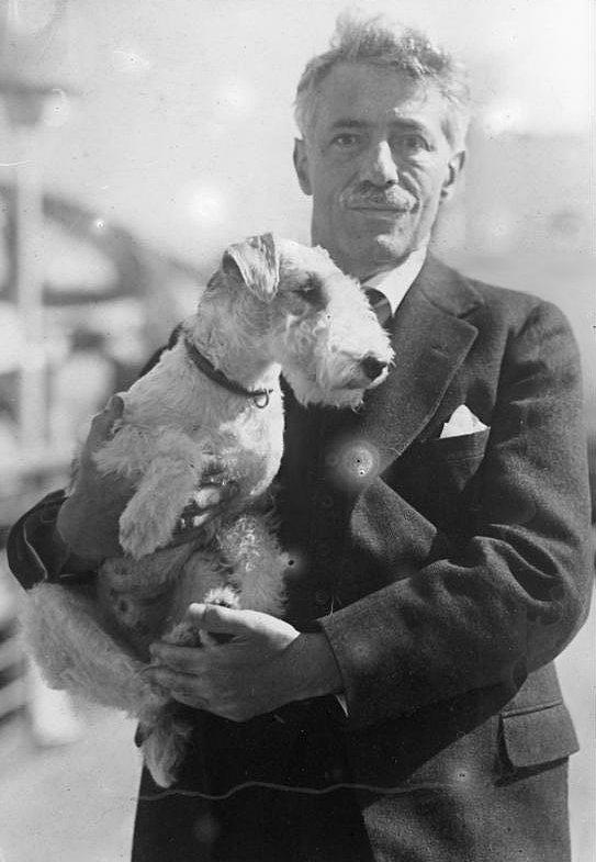 Violinist Fritz Kreisler in October 1930 with dog on board Europa travelling to New York.