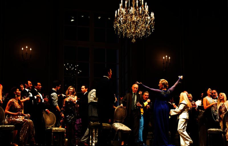 Party scene in La Traviata at Teatro alla Scala in Milan, Italy.