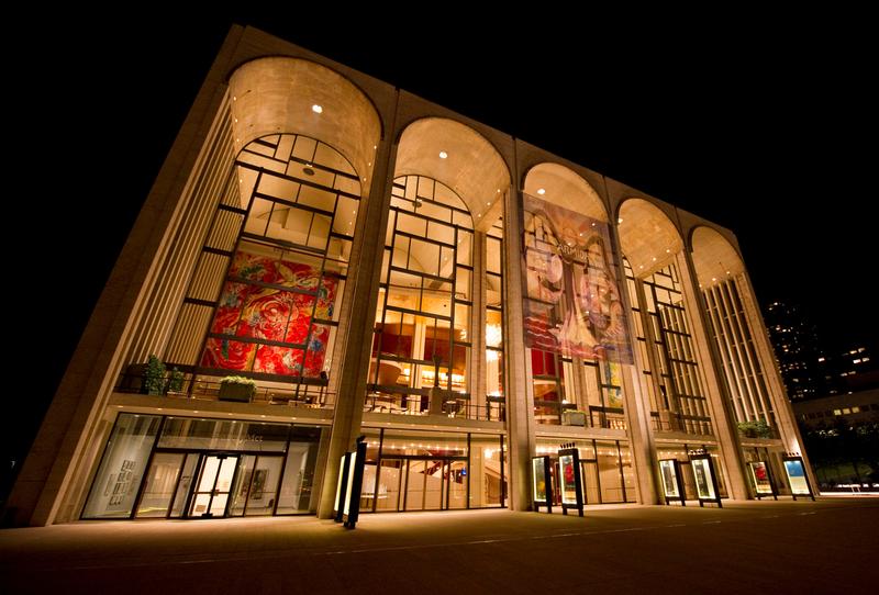 The Metropolitan Opera House at Lincoln Center Plaza, at night. 