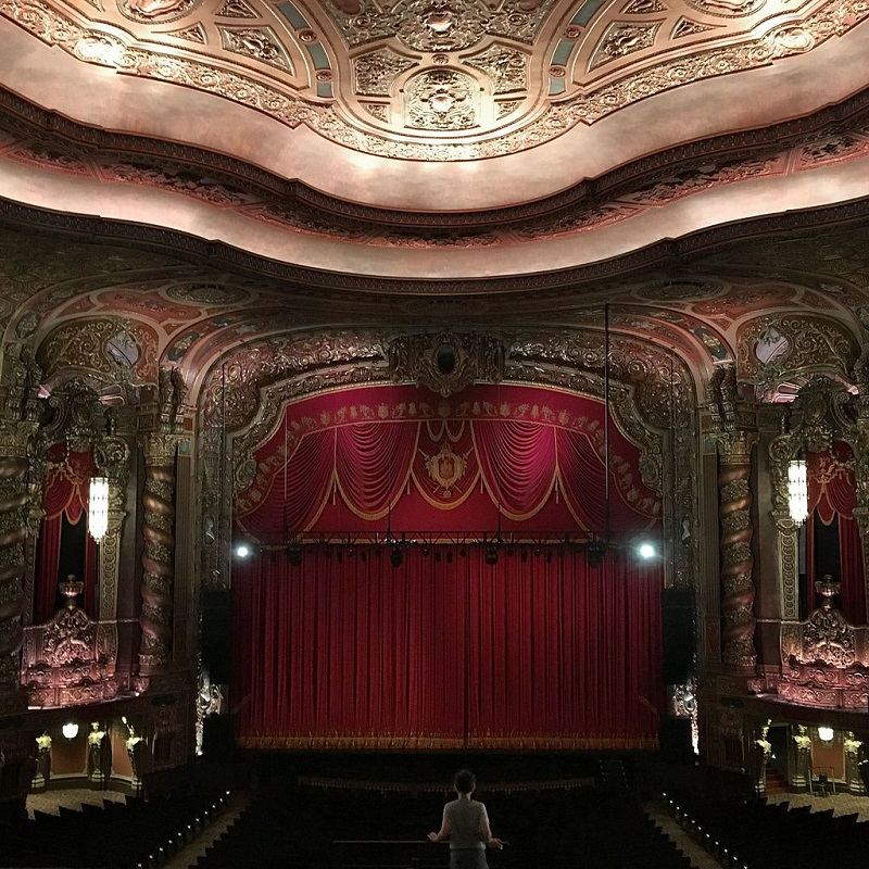 Young boy looks over the balcony at the Kings Theatre, Brooklyn Site: Kings Theatre.