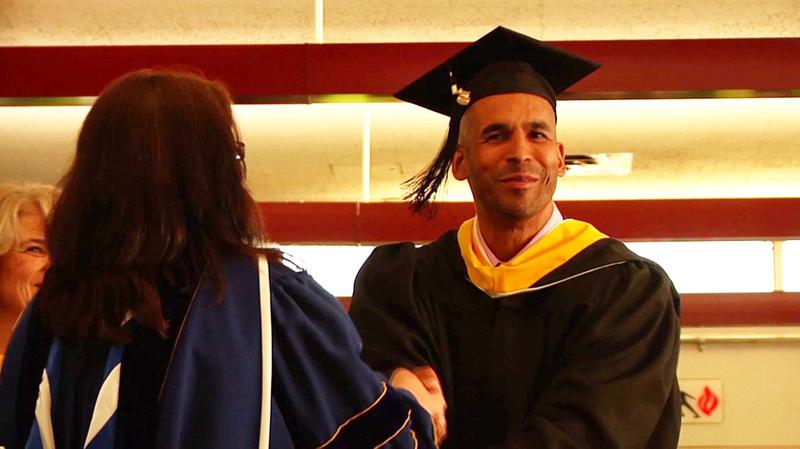 An inmate receives his diploma. From "University of Sing Sing," a film by Timothy Skousen